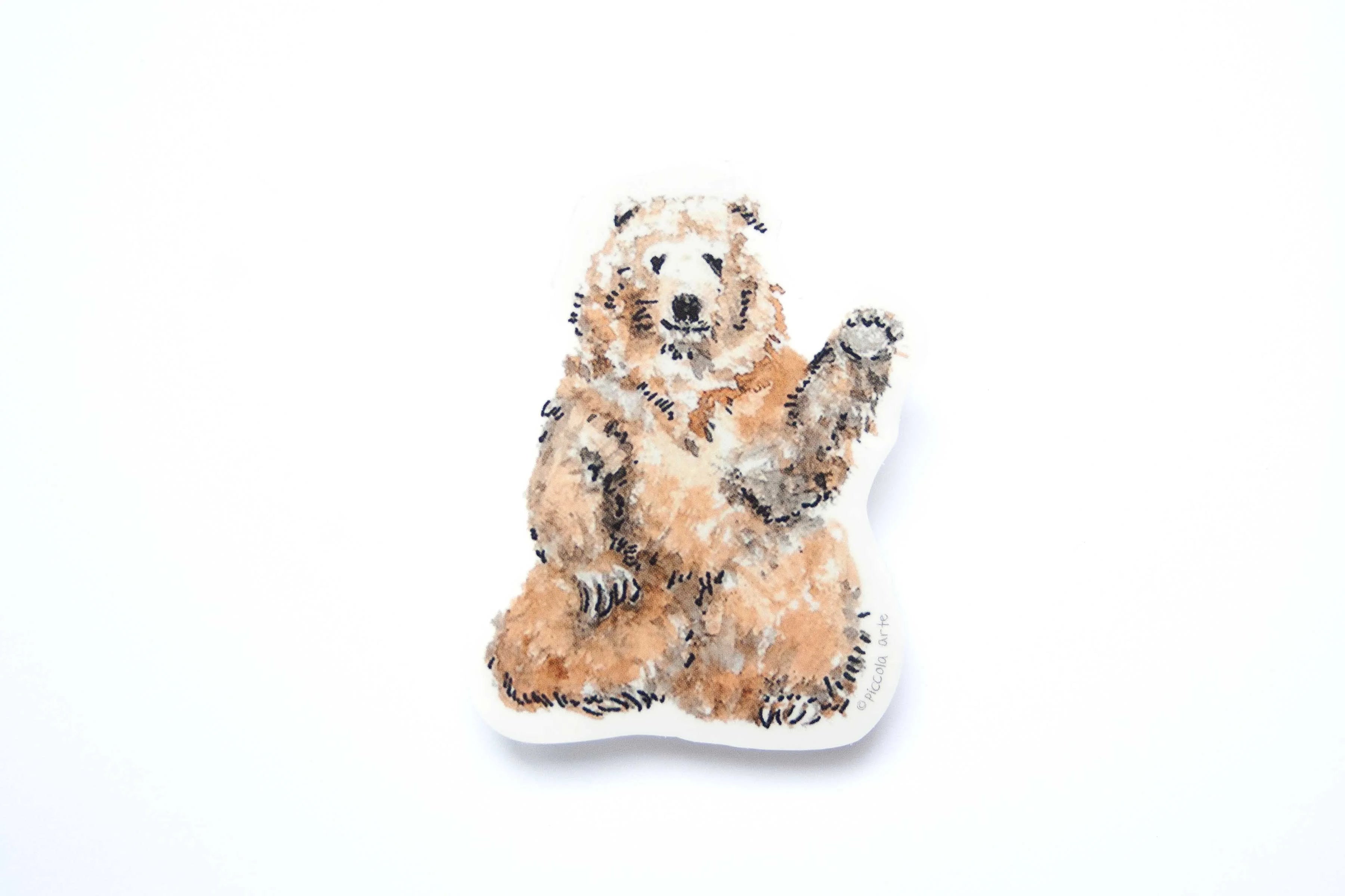 Stcker of a bear on a white background.