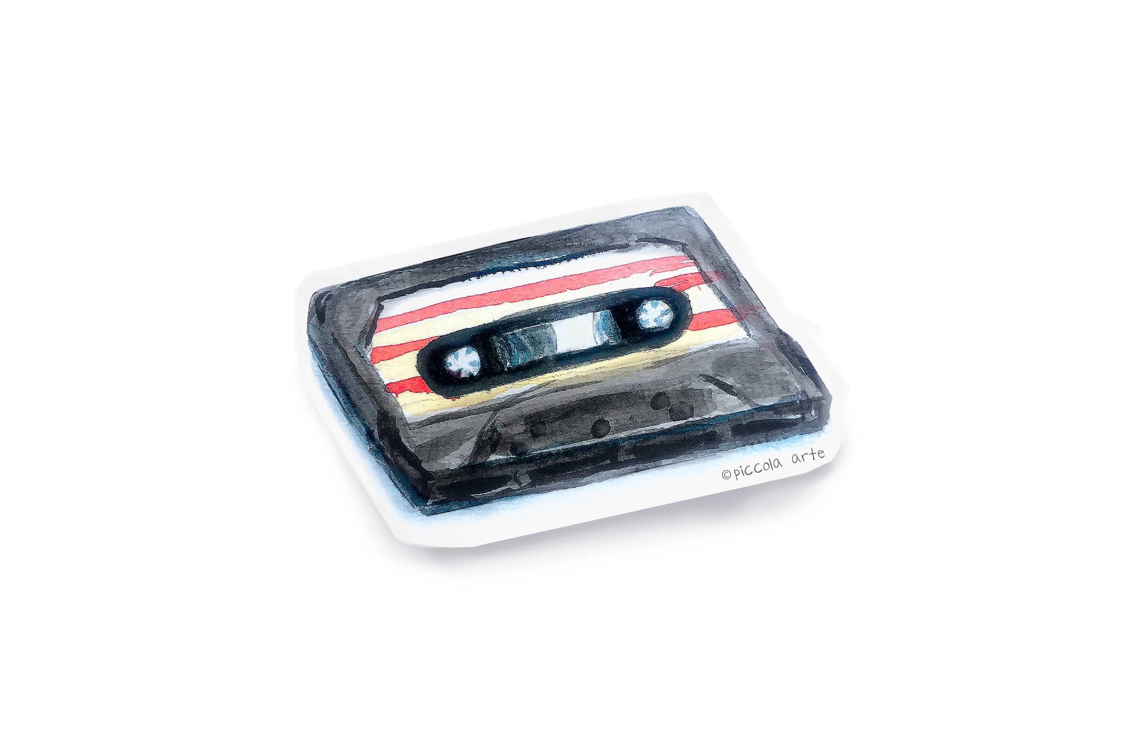 Cassette tape with red and white stripes on a white background cut-out sticker.