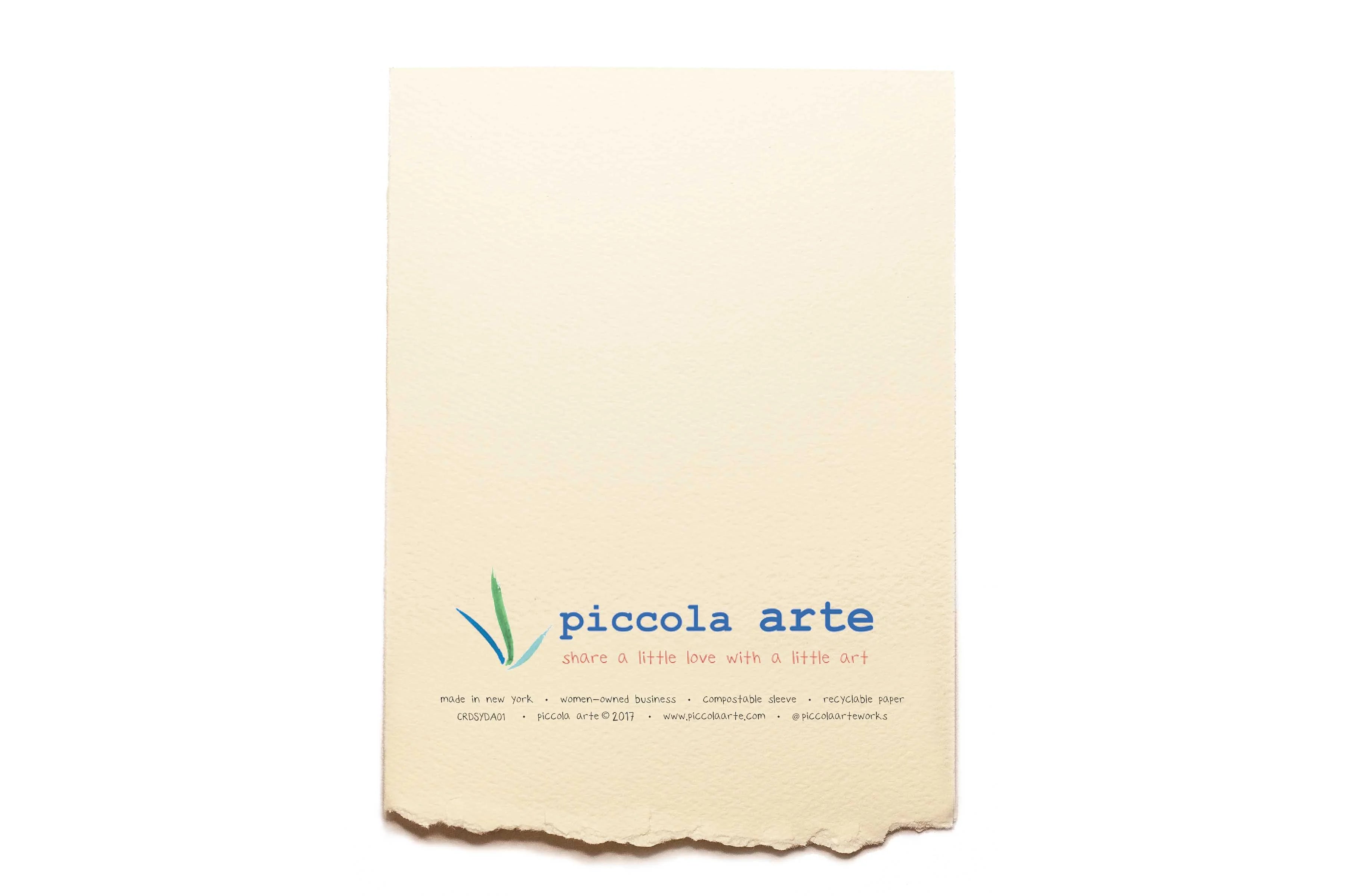 The back of a greeting card from piccola's arte.