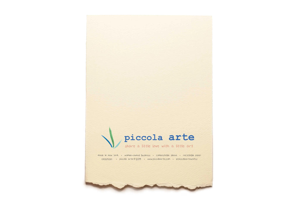 The back of a greeting card from piccola's arte.