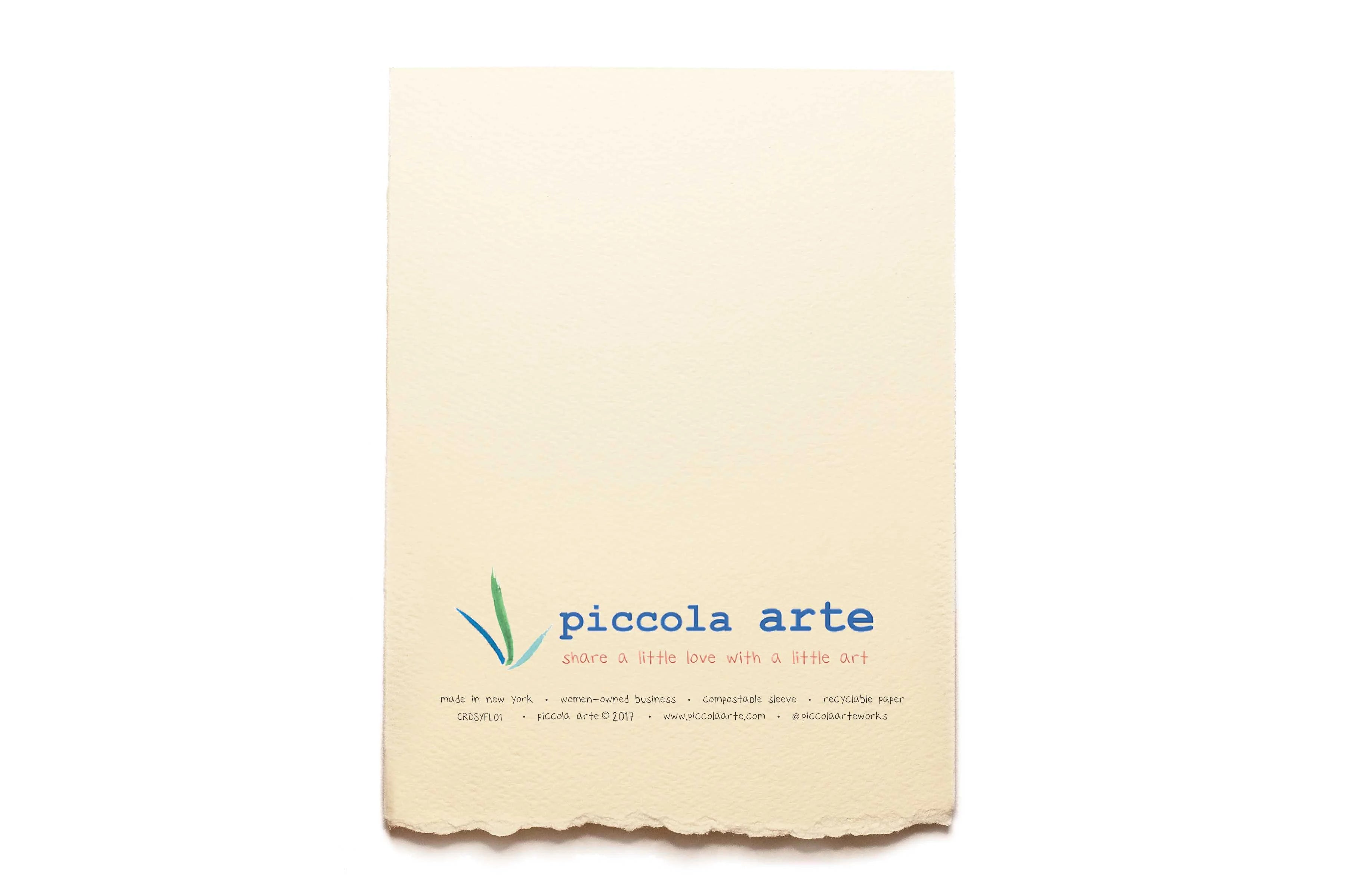 The back of a greeting card from piccola's arte.