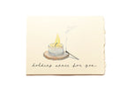 Greeting card with a candle illustration and text 'holding space for you' on a white background