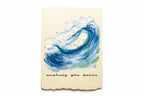 Card with blue wave design and 'wishing you peace' text on a beige background