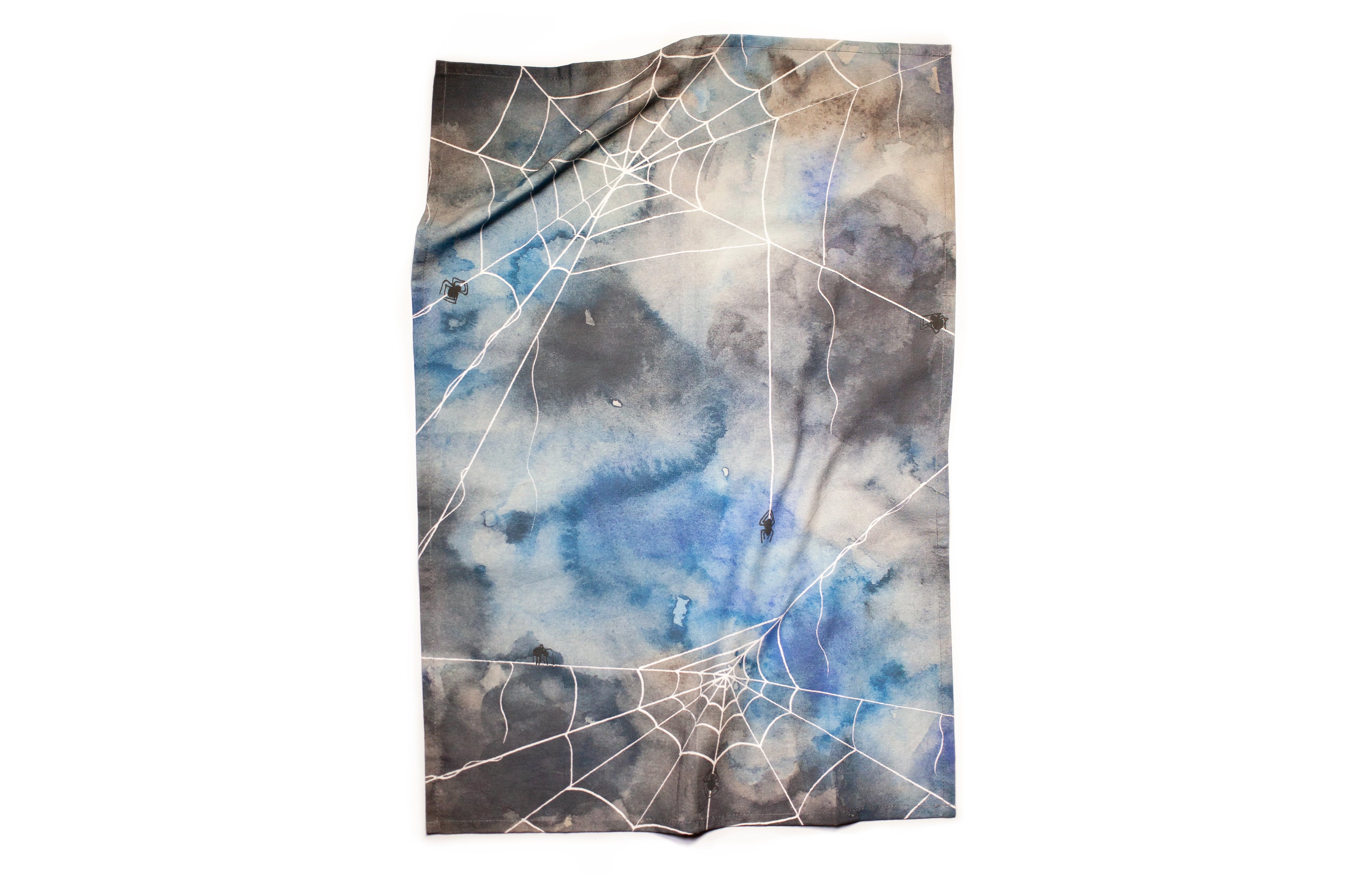 Fleece blanket with spider web pattern on a white background