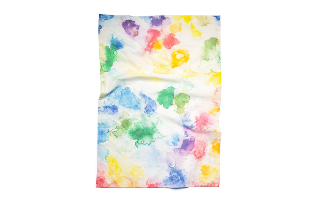 Colorful towel with abstract floral pattern on a white background