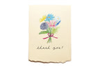 Card with a bouquet of flowers and 'thank you!' text on a beige background
