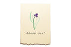 Beige card with a purple flower illustration and 'thank you!' text on a white background