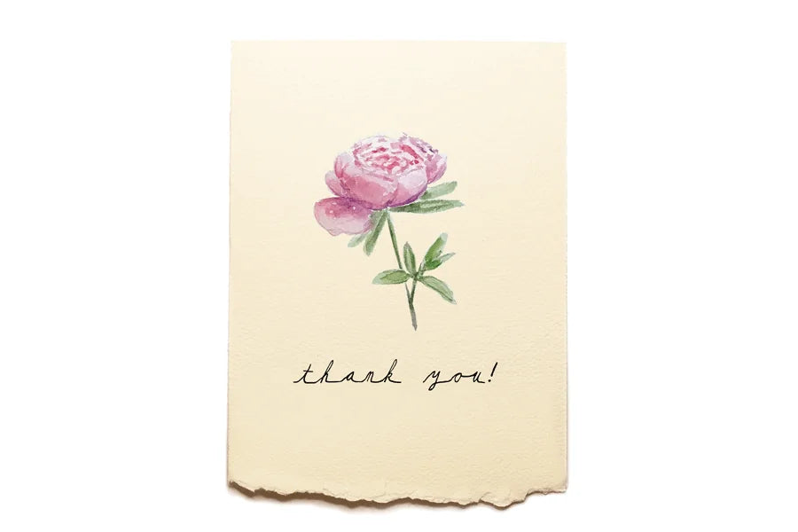Note card with a pink flower illustration and 'thank you!' text on a beige background