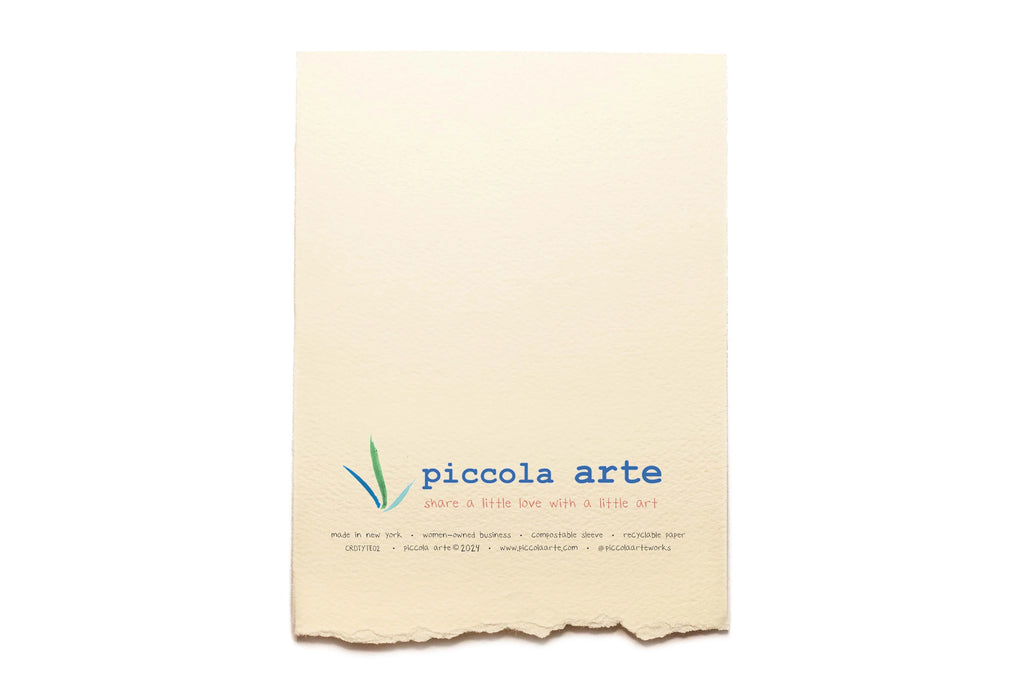 The back of a greeting card from piccola's arte.