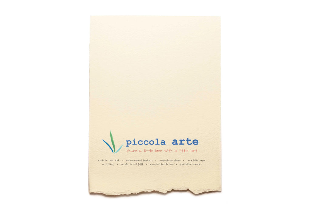 The back of a greeting card from piccola's arte.
