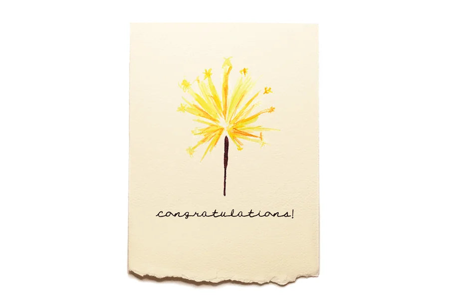 Card with yellow firework design and 'Congratulations!' text on a beige background