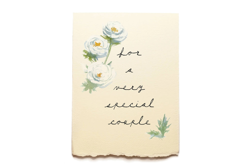 Card with floral design and text 'for a very special couple' on a beige background
